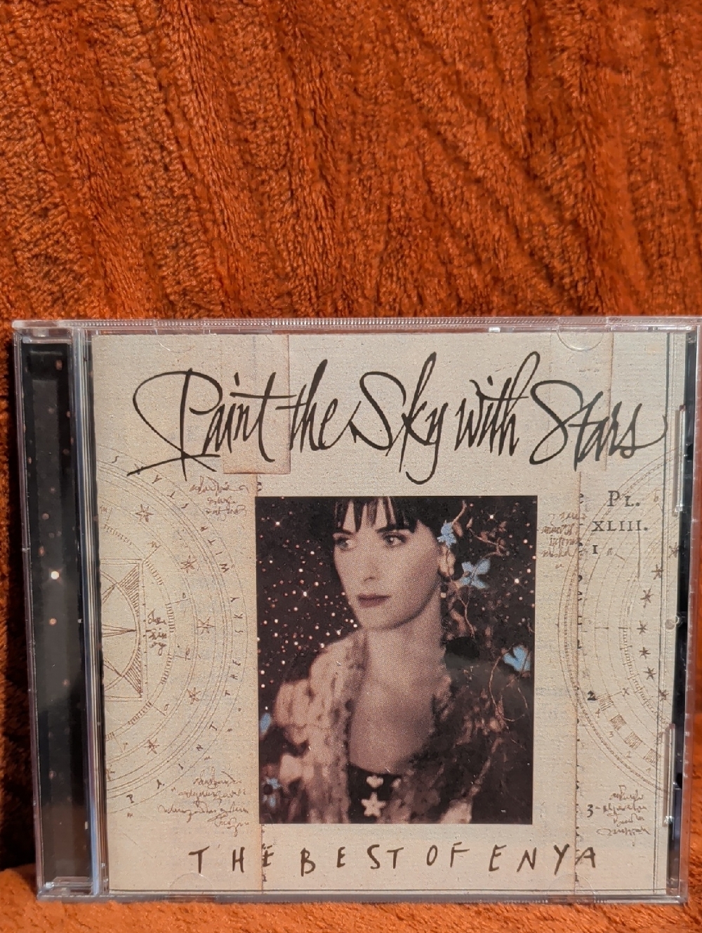 Paint the Sky with Stars — The Best of Enya (Beige & Black)